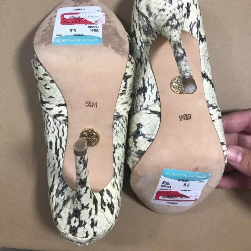 Tory Burch leg lengthening